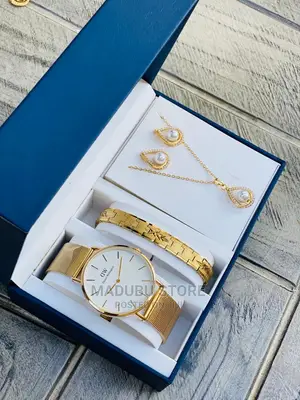 A Set of Watch, Bracelet, Necklace and Earrings