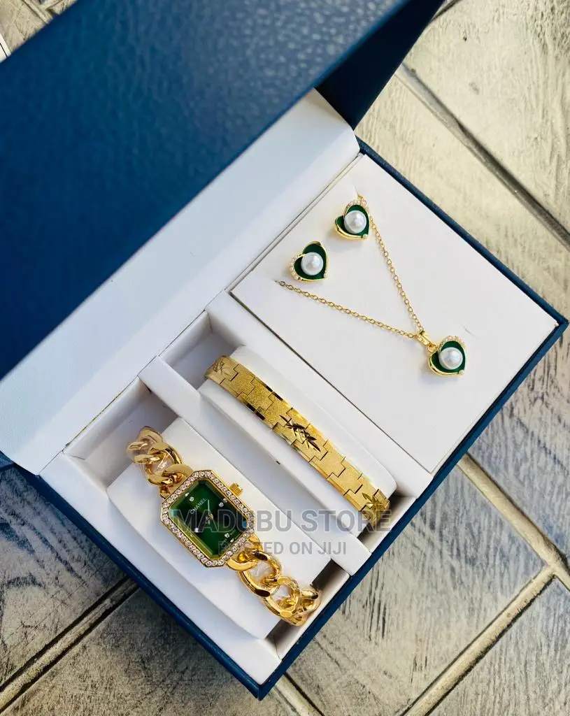 A Set of Watch, Bracelet, Necklace and Earrings
