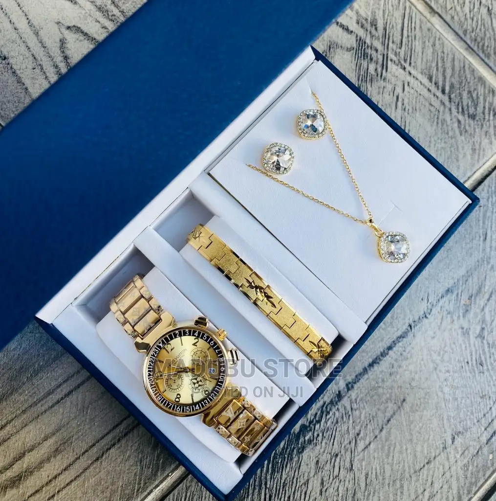 A Set of Watch, Bracelet, Necklace and Earrings