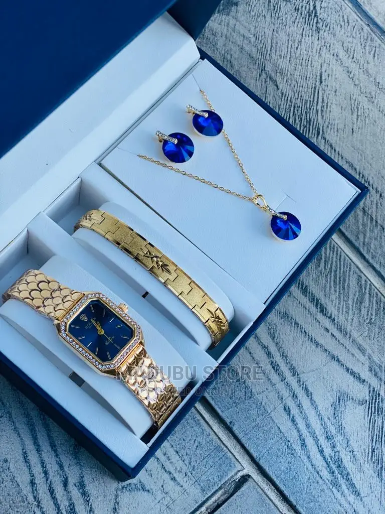 A Set of Watch, Bracelet, Necklace and Earrings