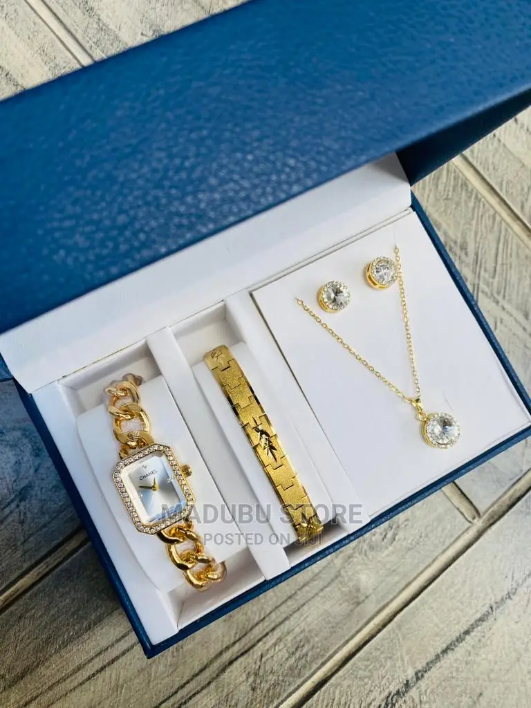 A Set of Watch, Bracelet, Necklace and Earrings