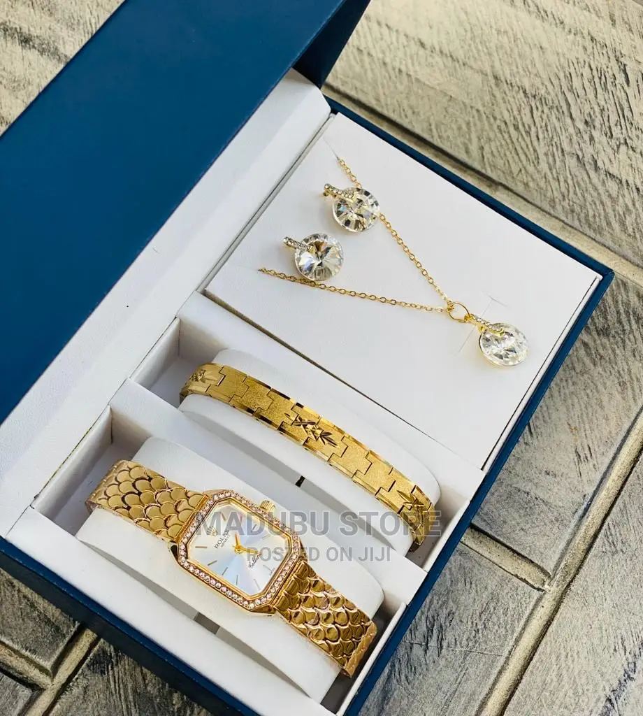 A Set of Watch, Bracelet, Necklace and Earrings