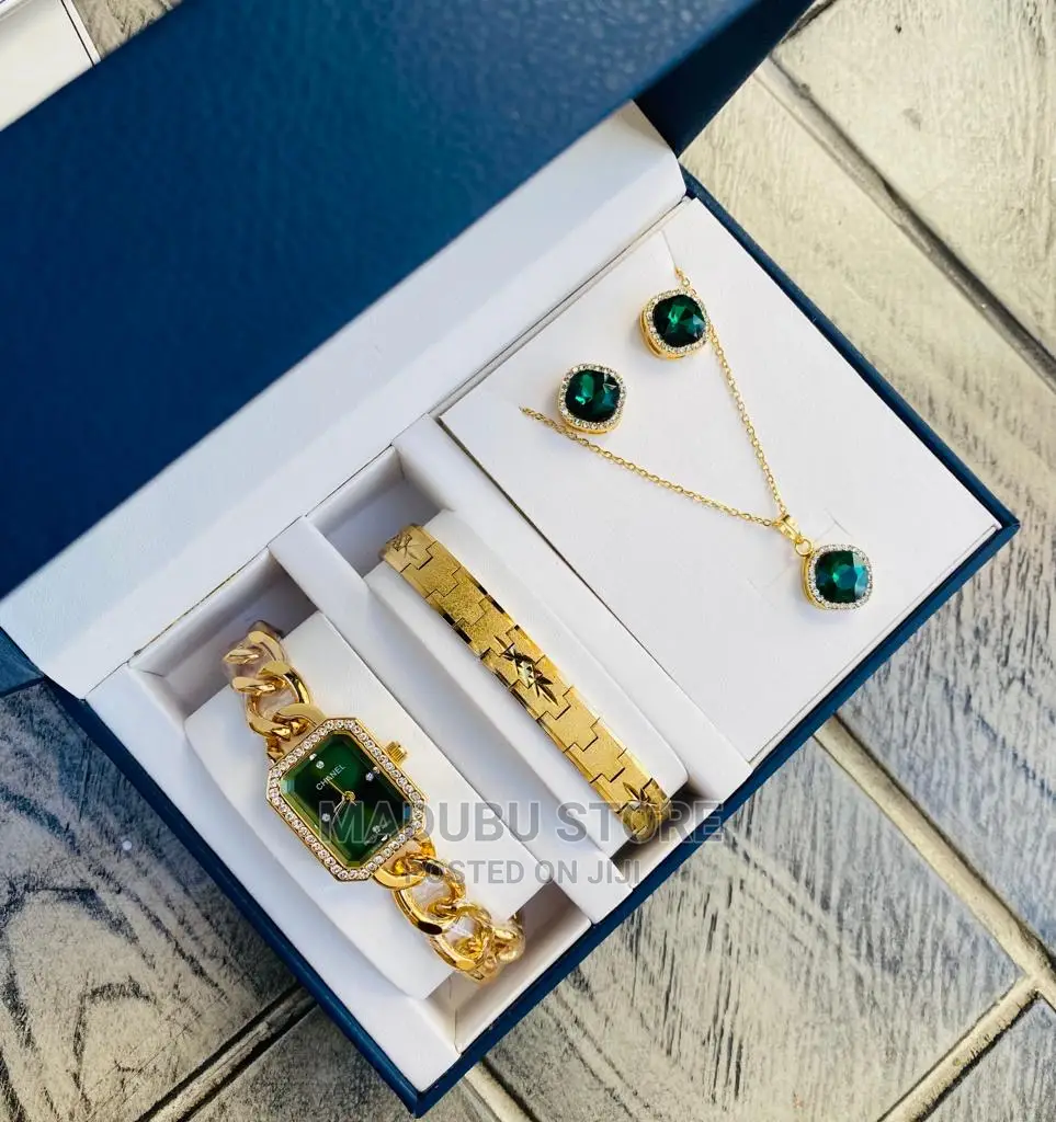 A Set of Watch, Bracelet, Necklace and Earrings