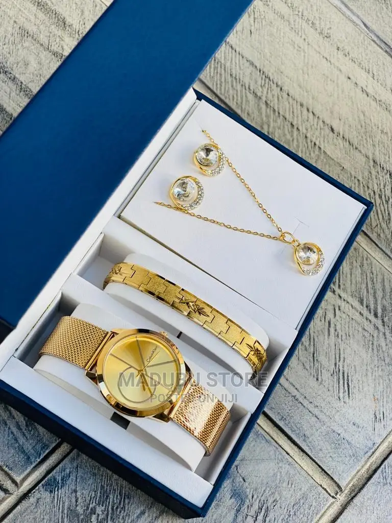 A Set of Watch, Bracelet, Necklace and Earrings