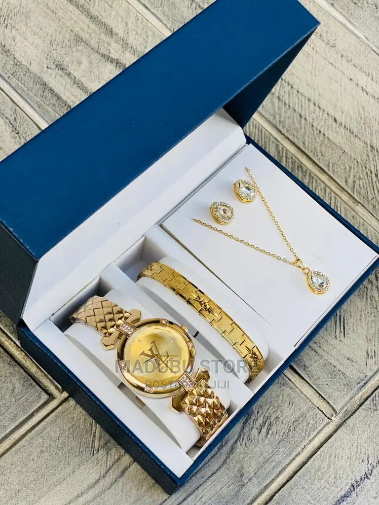 A Set of Watch, Bracelet, Necklace and Earrings