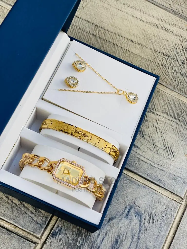 A Set of Watch, Bracelet, Necklace and Earrings
