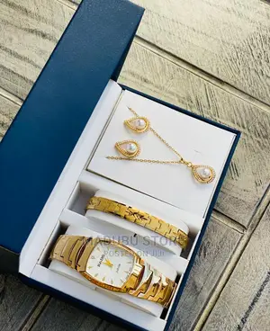 A Set of Watch, Bracelet, Necklace and Earrings