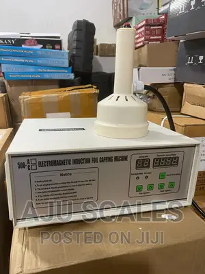Induction Foil Capping Machine.