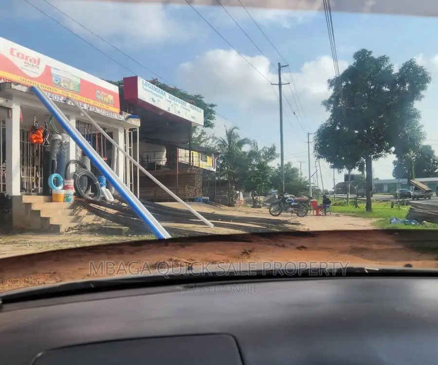 Plot Along Main Road With 2 Shop for Sale TSH 70mil at Madal