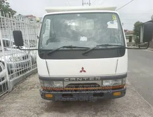 New Mitsubishi Canter Dumper Ya Helper Mpya.