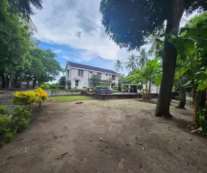 Plot for Sale at Mbezi Beach With House Inside