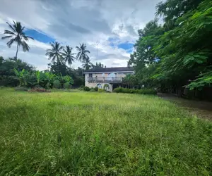Plot for Sale at Mbezi Beach With House Inside