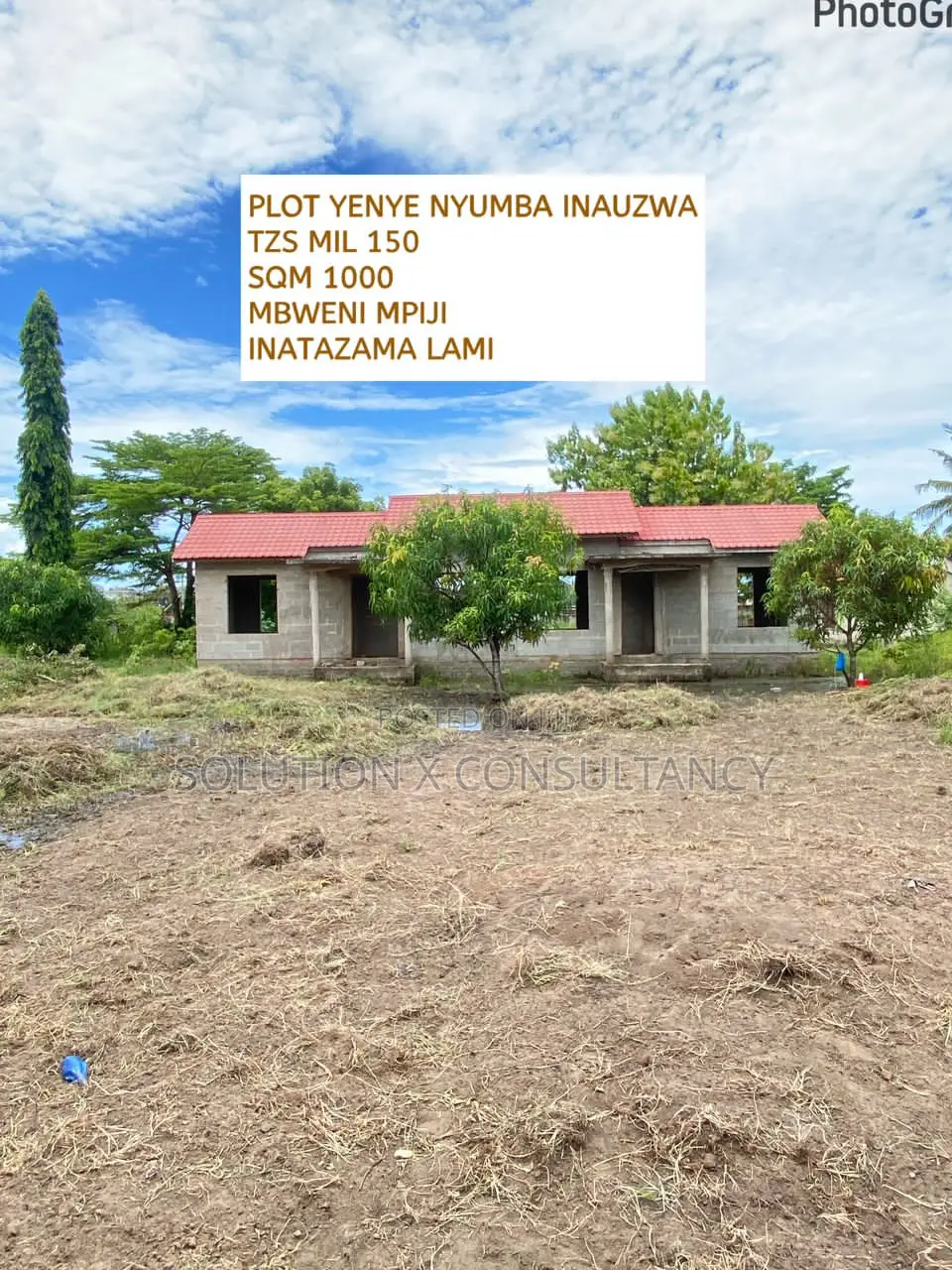 Kiwanja Kinauzwa Chenye Nyumba Kipo Mbweni Mpiji
