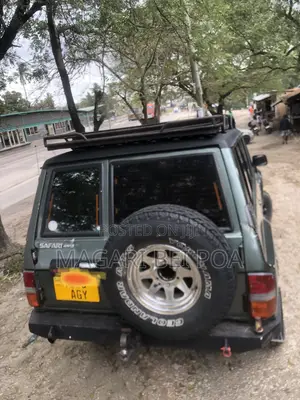 Nissan UA-QG 2000 Gray