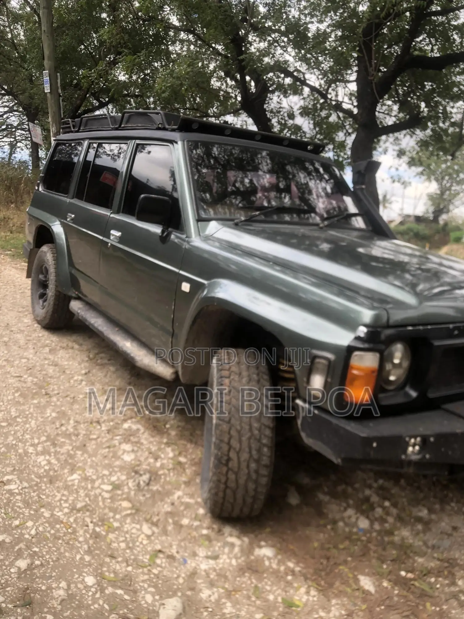 Nissan UA-QG 2000 Gray
