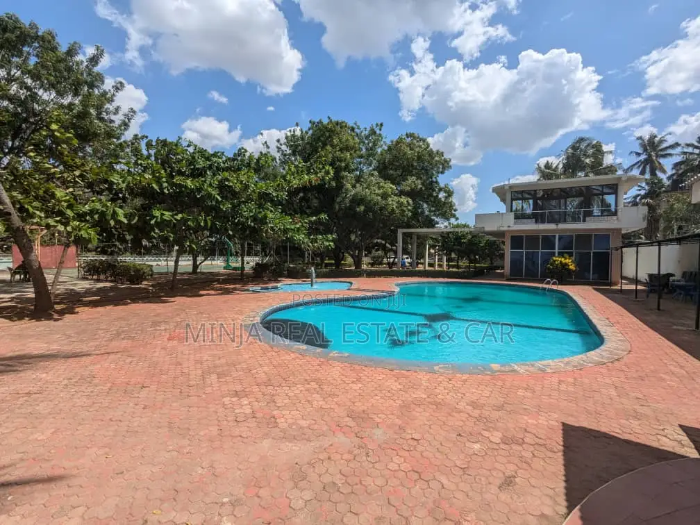 Beach Villa With 12 Houses in Compound for Sale in Mikocheni