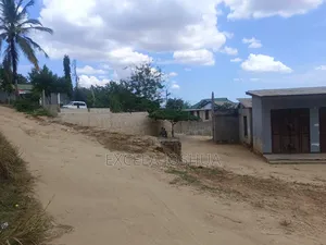Kiwanja CHA SQM 1000 Kinauzwa Goba Njia Panda Ya Tegeta A