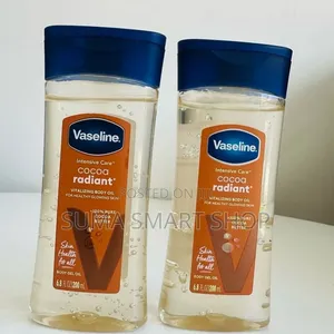 VASELINE Cocoa Radiant Body Oil .(New Look)