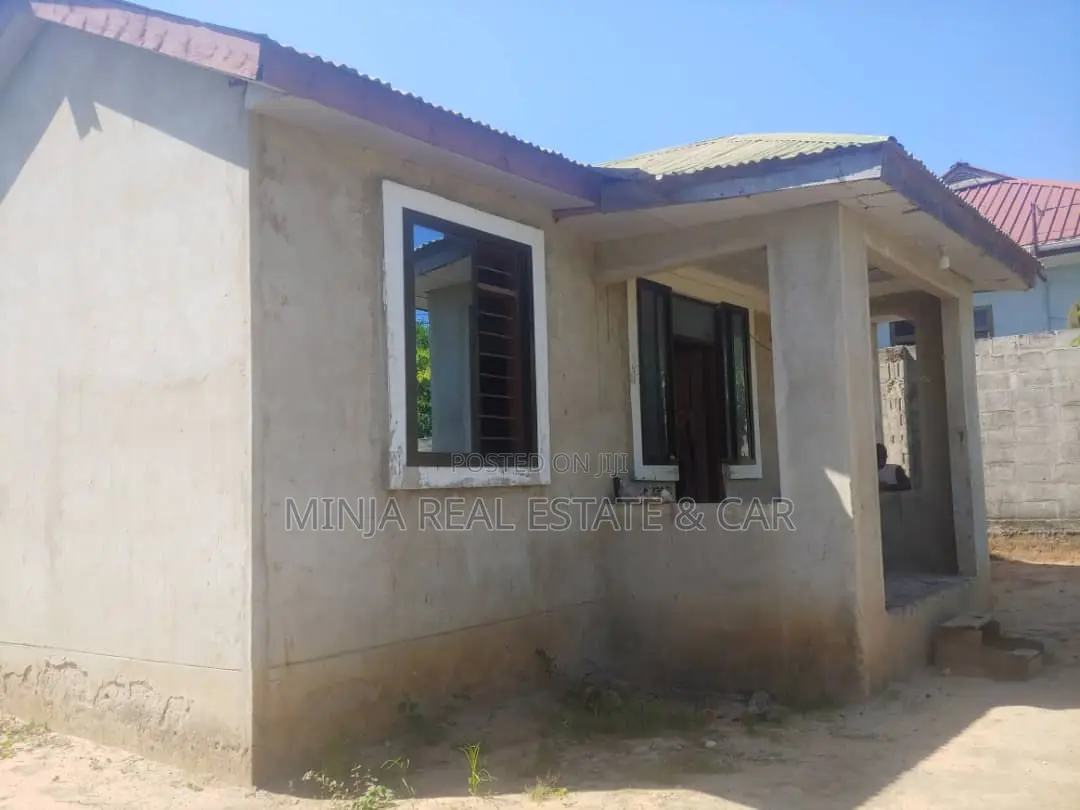 Plot For Sale With Small House For Sale In Bunju