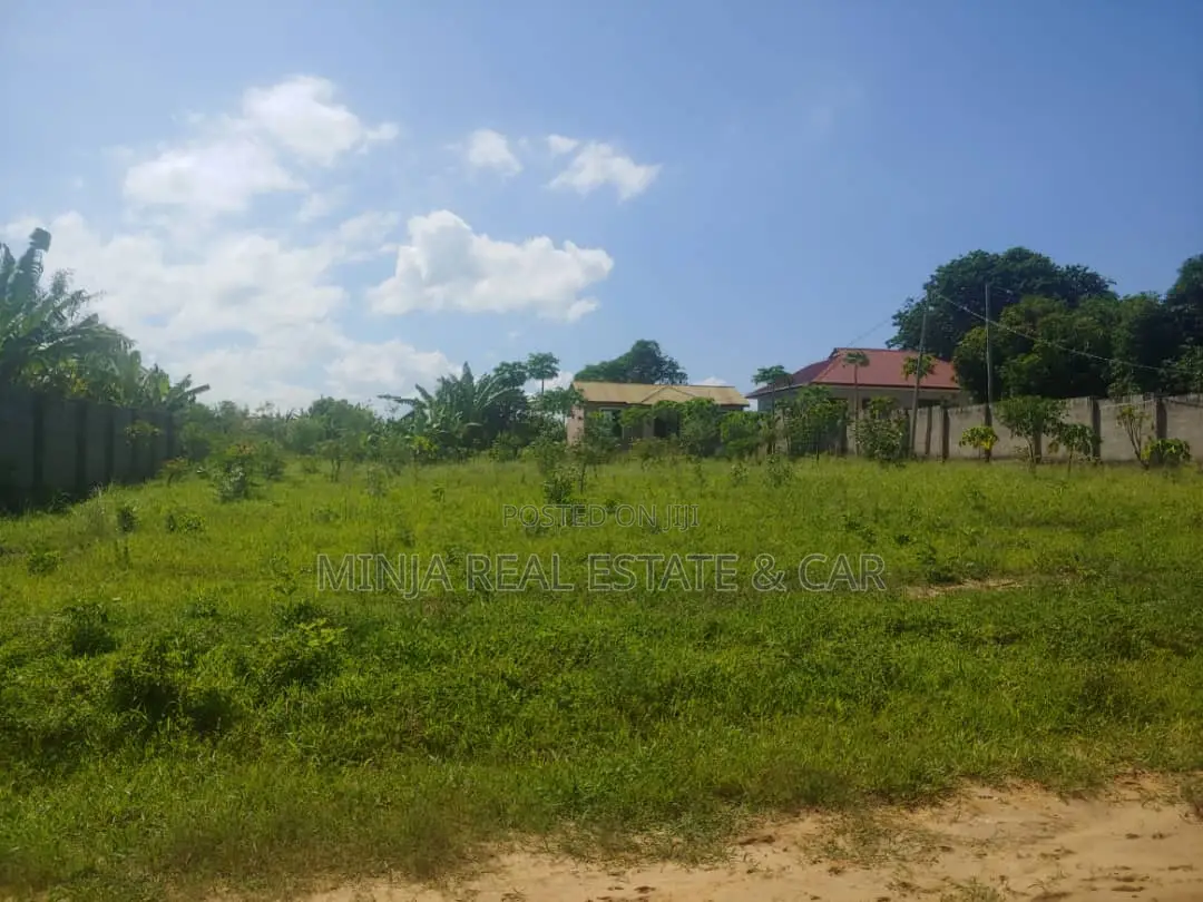 Plot For Sale With Small House For Sale In Bunju