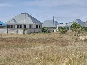 Kiwanja Kinauzwa Kigamboni Mwongozo