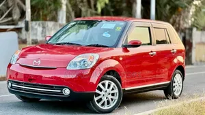 Mazda Verisa 2010 Red