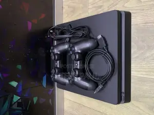 Ps4 Slim V9 Used in Pad Mbili Na Games Ndani