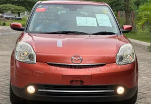 Mazda Verisa 2009 Red