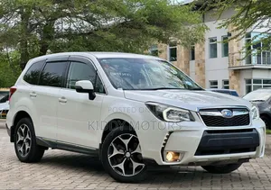 Subaru Forester 2.0XT Touring 4dr SUV AWD (2.0L 4cyl Turbo CVT) 2014 Pearl