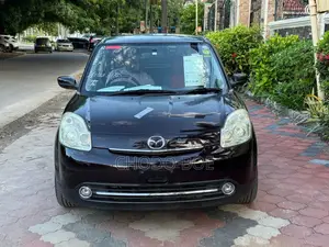 Mazda Verisa 2010 Burgundy