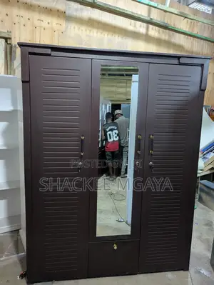 Brown Drawers Three Doors