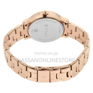 Titan Self Expression Rose Gold Dial Analog Watch