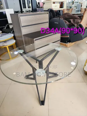 Round Glass Top Table With Star-Shaped Base