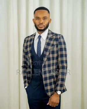 A Navy Suit With Beige Checkered Jacket, Vest, and Navy Trousers