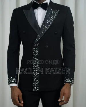 Black Suit With Black Satin Lapels Adorned With Silver Embellishments