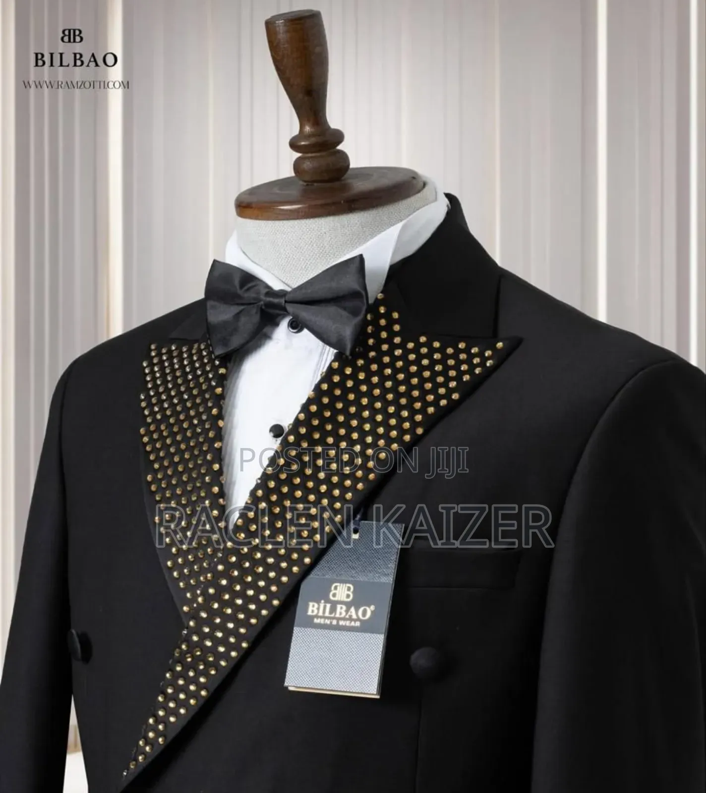Black Suit With Black Satin Lapels Adorned With Gold Embellishments