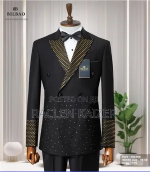 Black Suit With Black Satin Lapels Adorned With Gold Embellishments