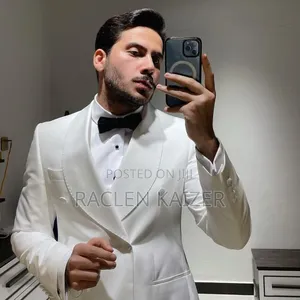 A Smooth, Solid Fabric Suits, Featuring a White Color