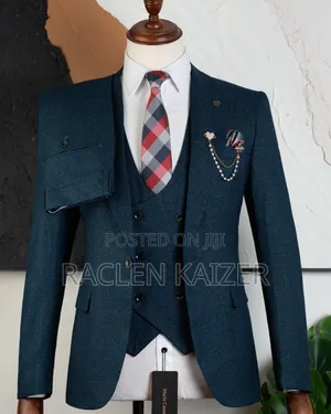 A Teal Color With a Textured Pattern Suits