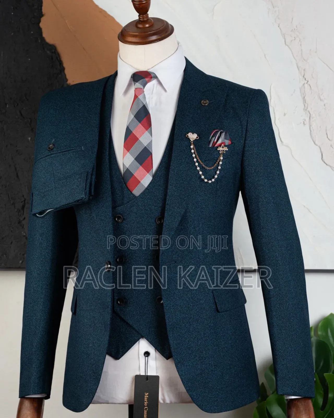 A Teal Color With a Textured Pattern Suits