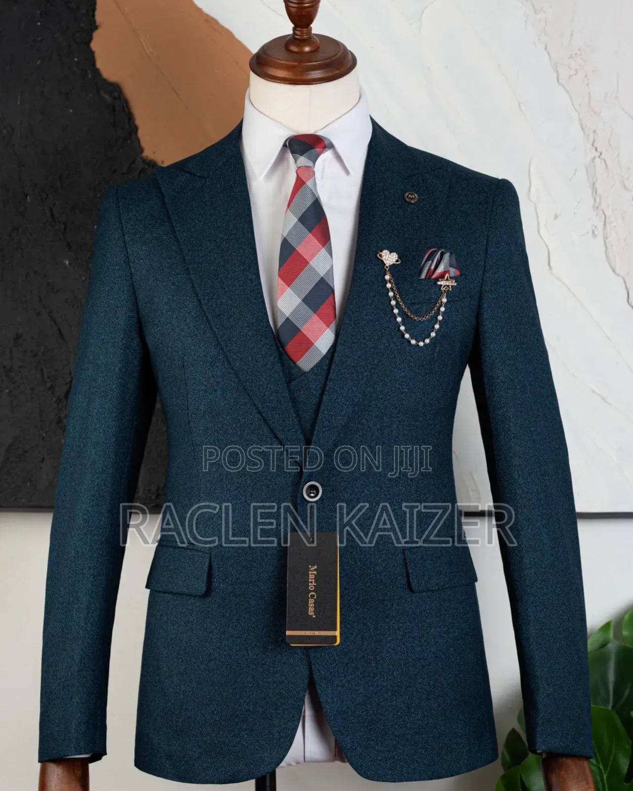 A Teal Color With a Textured Pattern Suits