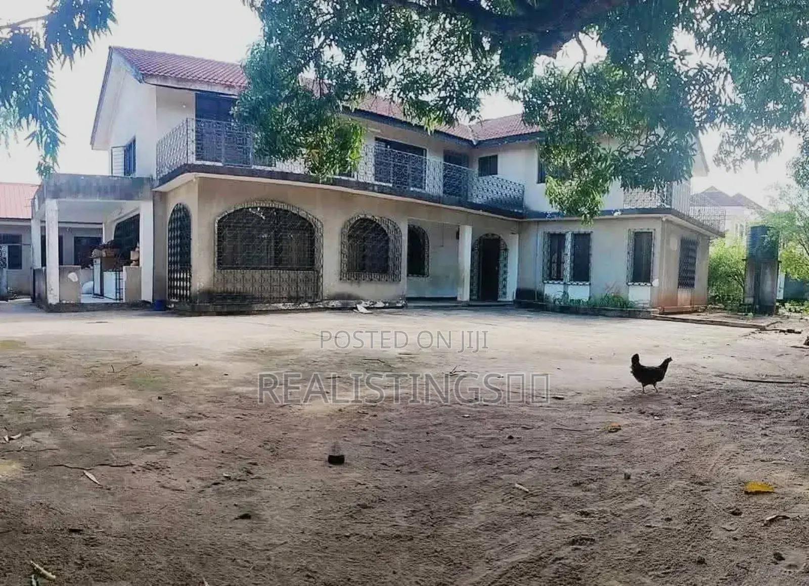 Mikocheni: 1,200 SQM Plot With 2 Houses for Sale - Dar