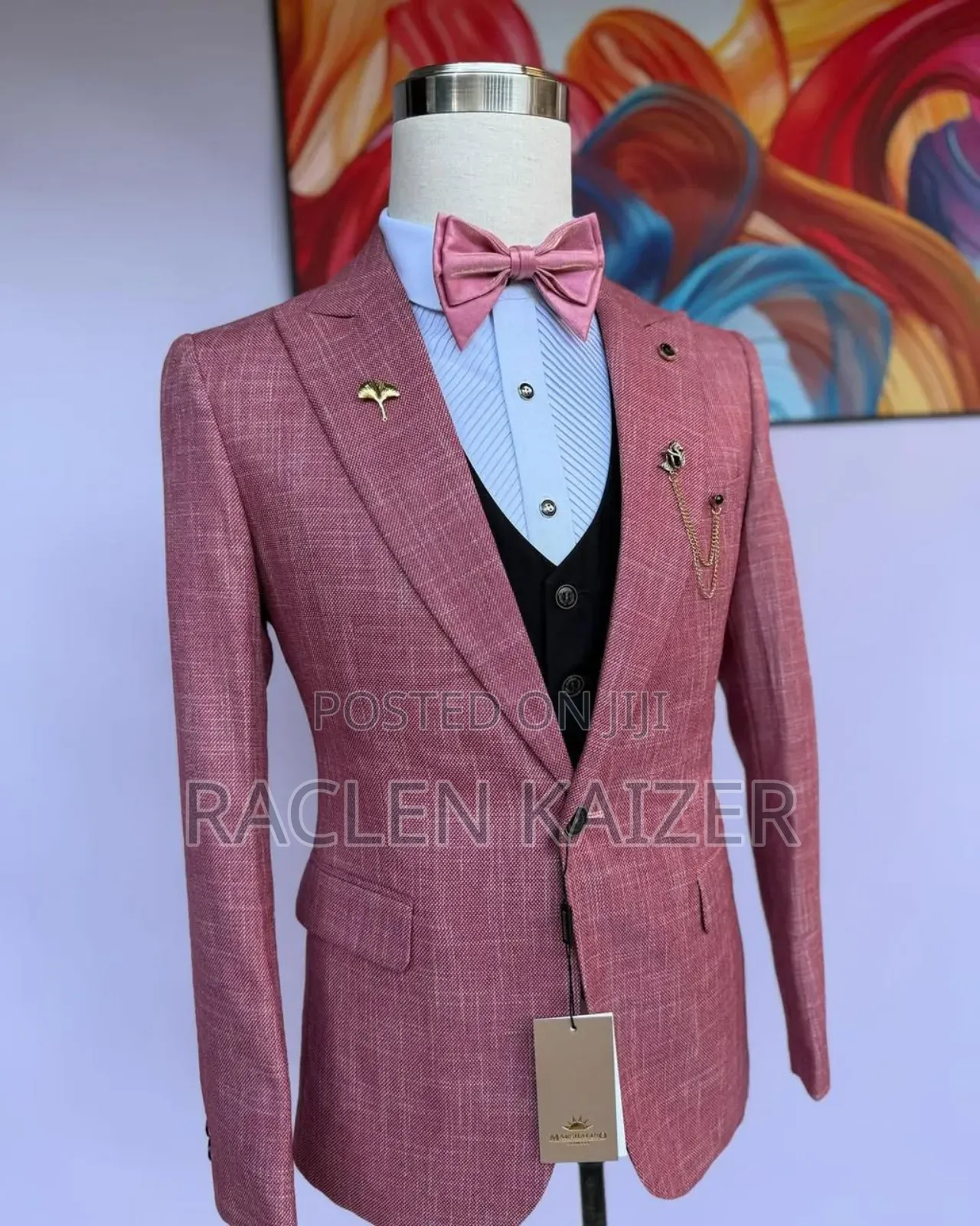 A Pinkish-Red With a Subtle Textured Pattern Suits