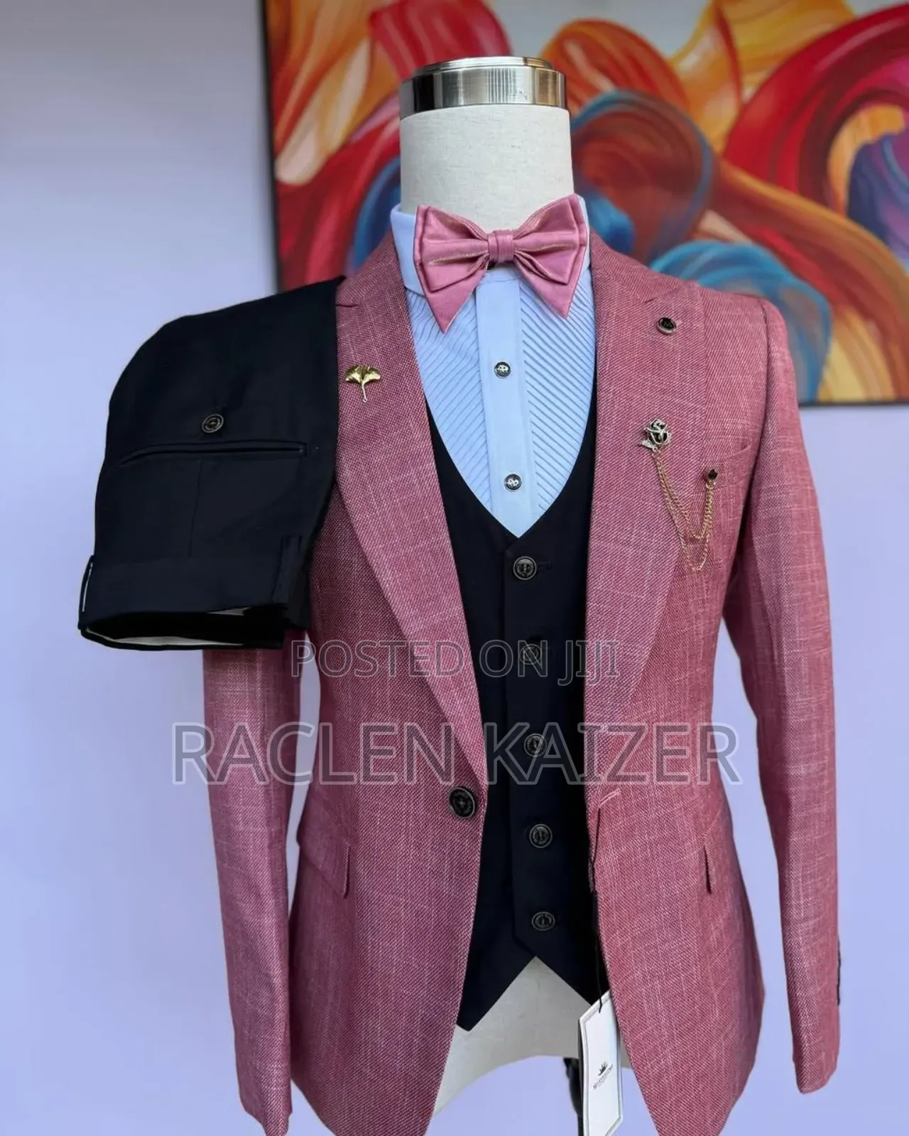 A Pinkish-Red With a Subtle Textured Pattern Suits