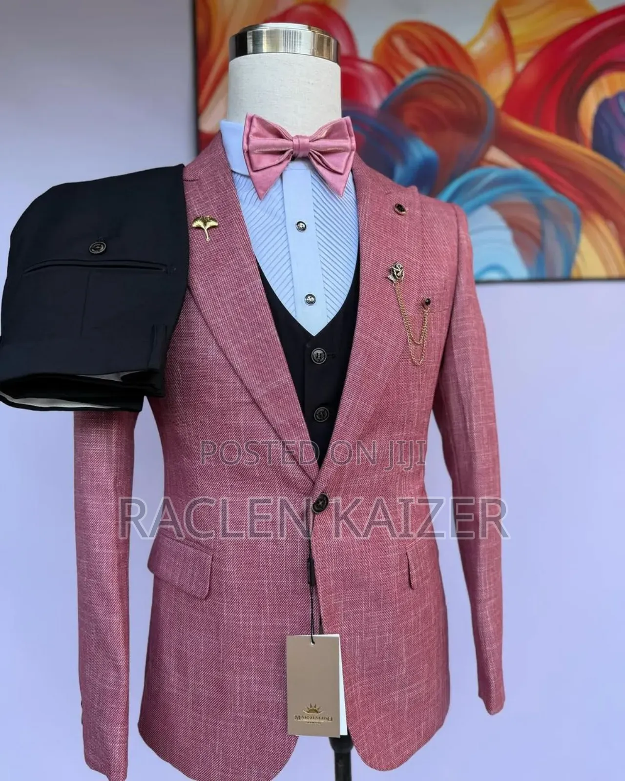A Pinkish-Red With a Subtle Textured Pattern Suits