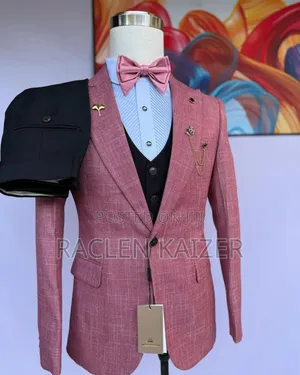 A Pinkish-Red With a Subtle Textured Pattern Suits