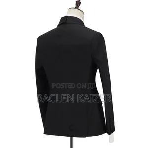 Black Tuxedo Suit With a Gold Chain