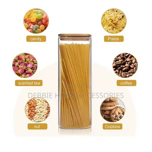 Three Glass Storage Jars With Bamboo Lids.