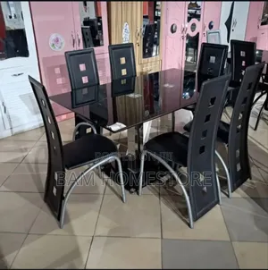 Contemporary 6-Seater Black Glass Dining Set With Designer Chairs