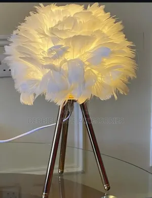 White Feather Table Lamp With a Tripod Base